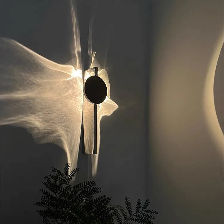 Ripple Rotating Ambient Wall Sconce